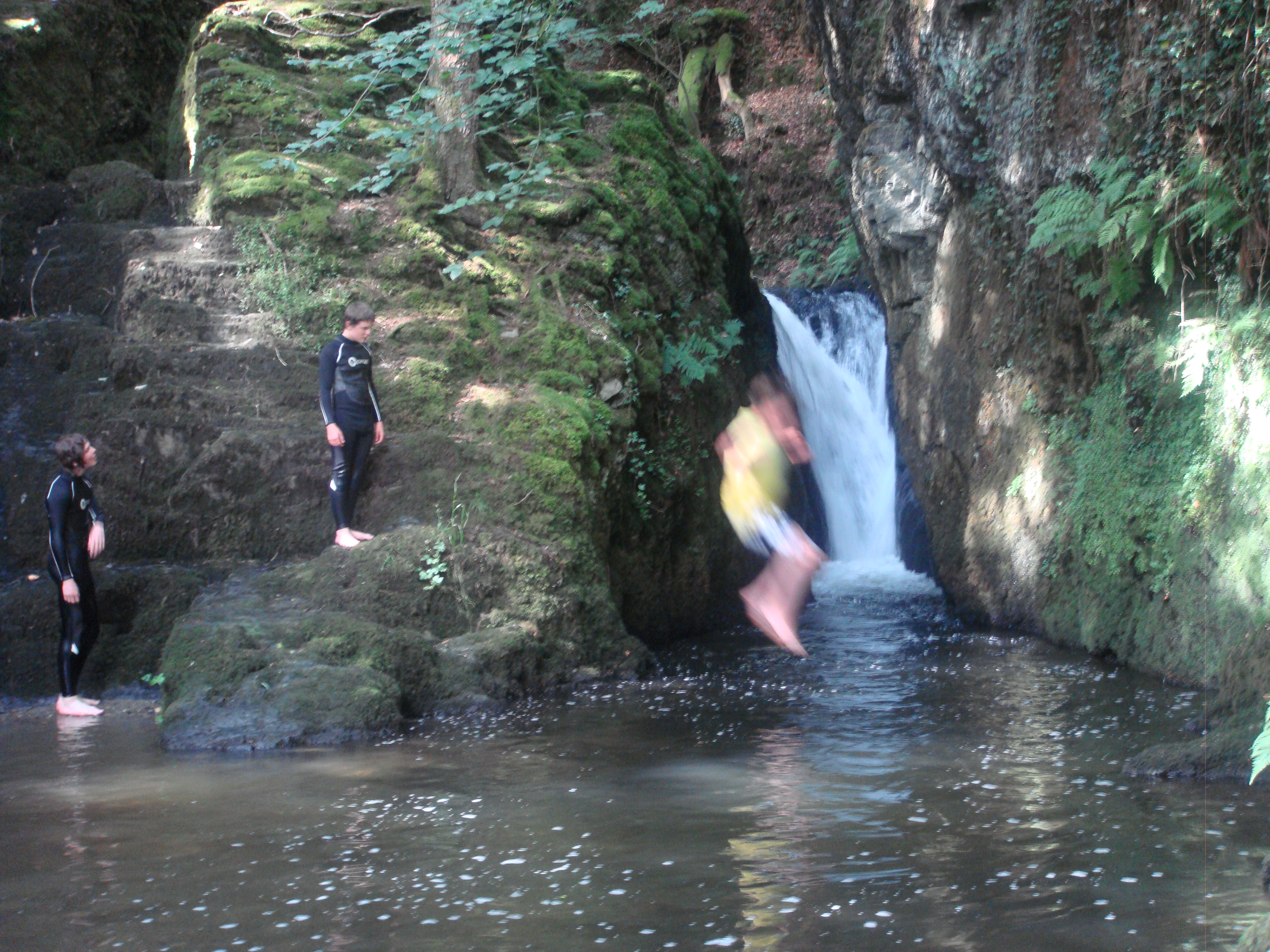 jumping kids at Ffynone waterfall